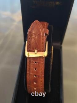 Montre Jaeger Lecoultre'tank' REF. 6129.21 cadran doré avec bracelet en