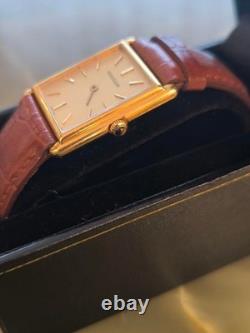 Montre Jaeger Lecoultre'tank' REF. 6129.21 cadran doré avec bracelet en