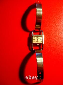 Montre de dame Jaeger Lecoultre. Modèle étrier siglé Hermès, bracelet argent