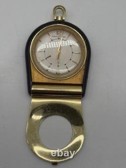 Montre de voyage Jaeger-LeCoultre vintage dorée et bleue fonctionnelle attache