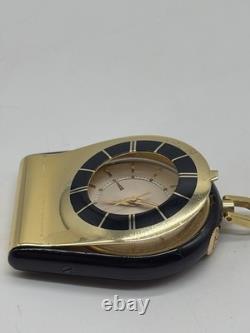 Montre de voyage Jaeger-LeCoultre vintage dorée et bleue fonctionnelle attache