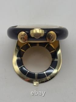 Montre de voyage Jaeger-LeCoultre vintage dorée et bleue fonctionnelle attache
