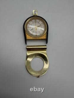 Montre de voyage Jaeger-LeCoultre vintage dorée et bleue fonctionnelle attache