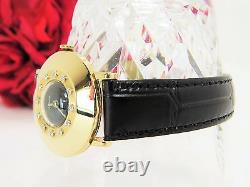 Vintage Le Coultre Montre Femme 14 K or jaune avec diamants avec bande en cuir