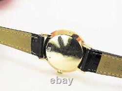 Vintage Le Coultre Montre Femme 14 K or jaune avec diamants avec bande en cuir